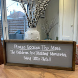 Made in the UK by Giggle Gift Co Rectangular L64cm Framed Plaque with Grey vinyl; "Please Excuse the Mess... the Children are making memories - Being little Shits!!"