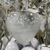 Heart shaped Glass Bauble 10cm filled with feathers with the quote;  Feathers appear when angels are near