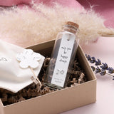 Sweet asymmetrical music note stud earrings presented in a message bottle on a card that reads "may you be happy always"  Sterling Silver