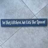 Long Wooden Hanging Sign - 'In This Kitchen, We Lick The Spoon!'