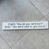 Long Wooden Hanging Sign - 'Piglet: how do you spell love?..'