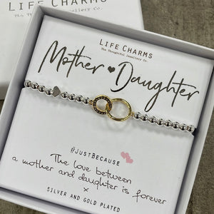 Life Charms Silver Plated Bracelet with intertwining gold hearts charm - reads "Mother & Daughter #justbecause The love between a mother and daughter is forever x"