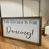 Made in the UK by Giggle Gift Co Rectangular L63.5cm Framed Plaque with white vinyl; "This Kitchen is for dancing!"