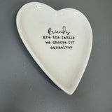 White Ceramic Small 10cm Heart Dish with a quote in black text;
'Friends are the family we choose for ourselves'