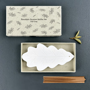 East of India White ceramic large Oak leaf incense stick holder 13x7cm Comes in a gift box and includes 10 Black Pomegrante incense sticks