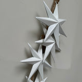 Hanging white metal bunch of Stars