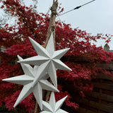 Hanging white metal bunch of Stars