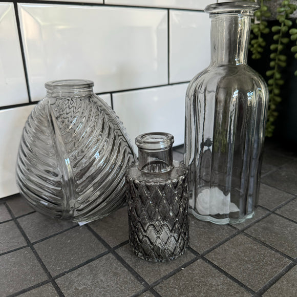 Smokey Grey Small Glass Bottle Vases
Various styles
Leaf pattern H13 x Dia 11cm

Tall Slim Ribbed H22.5 x Dia 10cm

Tall Ribbed H19 x Dia 7.5cm
Mini Geometric Bottle H9cm x Dia 5cm