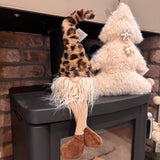 Shelf sitting plush Gonk with a tall leopard print faux fur hat, long off-white beard, and long soft dangling legs with brown corduroy boots 45cm.
