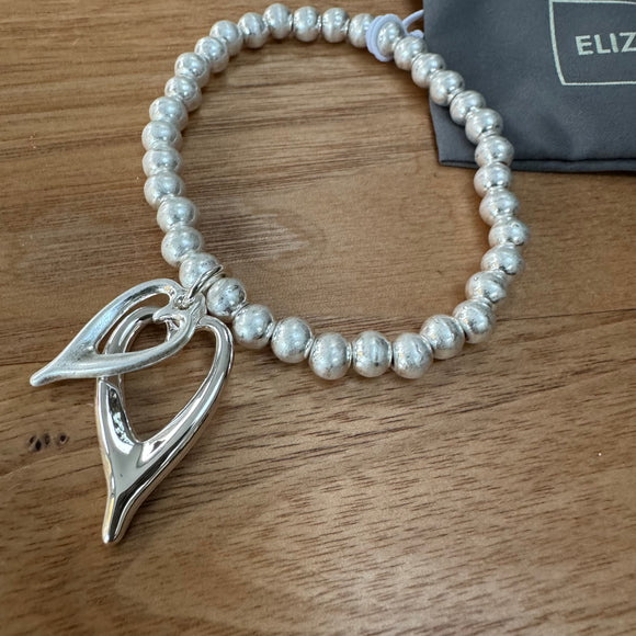 Eliza Gracious - Stretch bracelet with twin heart charms | Matt Silver