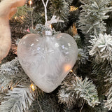 Special heart shaped Glass Bauble 10cm filled with soft white feathers
Quote - Baby's 1st Christmas&nbsp;