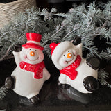 Ceramic Christmas glazed playful tumbling festive Snowmen&nbsp; 9.5cm
Available in two poses - Wearing a top hat &amp; Wearing a Santa hat