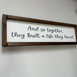 Made in the UK by Giggle Gift co. Rectangular L64cm Framed Plaque with Old White vinyl; Quote - And so together, they built a life they loved