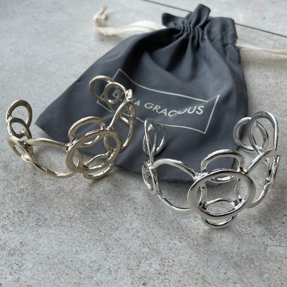Eliza Gracious - Intertwined Ring Cuff Style Bangle Available in Matt Silver and Pale Gold EB0438