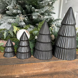 Matt Black Ceramic Tree Ornaments, available in 4 sizes;
Extra Small 8cm - £4.00
Small 12cm - £6.00
Medium 17cm - £9.00
Large 24cm - £15

Stylish black ceramic tree ornaments will make a statement decoration styled with other contemporary decorations suitable all year round