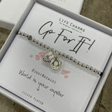 Life Charms the Thoughtful Jewellery Co. Just Because Bracelet Collection; Go For It! World is your oyster x Pure silver plated with cute hanging oyster shell charm that opens to reveal a pearl inside, presented on a 5mm beaded stretch bracelet. 