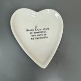 White Ceramic Small 10cm Heart Dish with a quote in black text;
'Every love story is beautiful, but ours is my favourite;