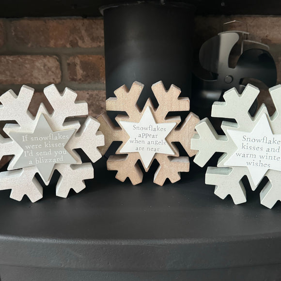 Wooden standing Snowflake shaped blocks with a glitter finish H14cm 
Available in three quotes;
White glitter block - If snowflakes were kisses I'd send you a blizzard
Soft grey glitter block - Snowflake kisses and warm winter wishes 

Wooden glitter block - Snowflakes appear when angels are near