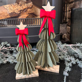 Layered Green felt Tree finished off with a red bow at the top and a wooden star stood on a wooden base&nbsp;
Available in 2 sizes: Small 24.5cm &amp; Large 31.5cm

