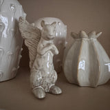 Ceramic glazed off white &amp; rustic beige tones Foraging Squirrel H20cm in an upright pose &amp; curled tail.