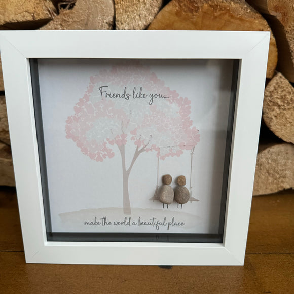 <p><em><strong>Pebble Art by La De Da Living </strong></em></p> <p><em><strong>Award winning keepsake gifts - Handmade in the Cotswolds </strong></em></p> <h3><br></h3> <h3>Framed Pebble Art - Midi White block square frame 17.5cm</h3> <h3>'Friends like you.... make the world a beautiful place'</h3> <p> </p>
