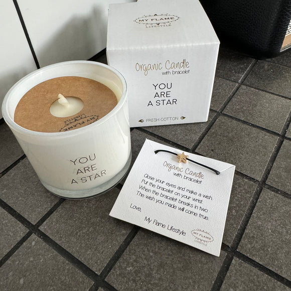 Soy Candle 6.5cm with a Wish-bracelet
Presented in a White Glass Jar with the Fragrance Fresh Cotton
Quote on the Candle Jar -  'You are a Star'