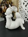 White Ceramic Rabbits kissing