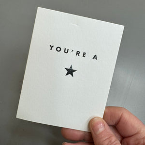 Chalk UK Card Collection - Simple designs but classy



White card 118x90mm, blank inside for your own personal message;

Black text 'YOU'RE A' and a Silver foil&nbsp;star symbol&nbsp;