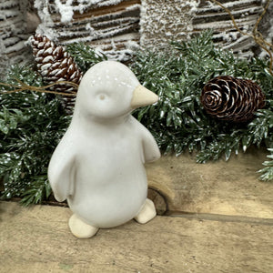 White Reactive Glaze Ceramic Standing Penguins
Available in 2 sizes; - Small 11cm &amp; Large 15cm