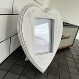 <h3>Wooden Whitewashed Heart Shape Photo Frame H27cm</h3> <h3>Aperture 6x4 photo</h3>