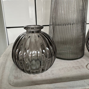 Smokey Grey Small Glass Bottle Vases Various styles Round Ribbed H8.3 x Dia 8.4cm Leaf pattern H13 x Dia 11cm Tall Slim Ribbed H22.5 x Dia 10cm