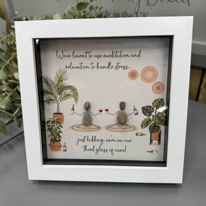 Pebble Art by La De Da Living&nbsp;

Award winning keepsake gifts - Handmade in the Cotswolds&nbsp;

Framed Pebble Art - Midi White block square frame 17.5cm
Quote - 'We've learnt to use meditation and relaxation to handle stress - just kidding, were on our third glass of wine!'