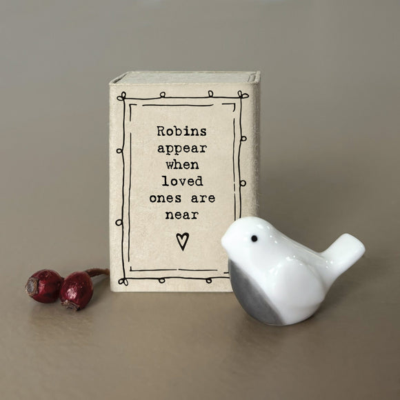 Christmas East of India quotable matchbox collection

Porcelain Robin presented in a small matchbox with the words;
' Robins appear when loved ones are near'