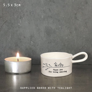 East of India Perfect Gifts with a meaningful quotes;
Small round T-LIght holder with handle 5.5x3cm gift boxed &amp; t-light included
Quote 'Thanks for being amazing'&nbsp; 5706