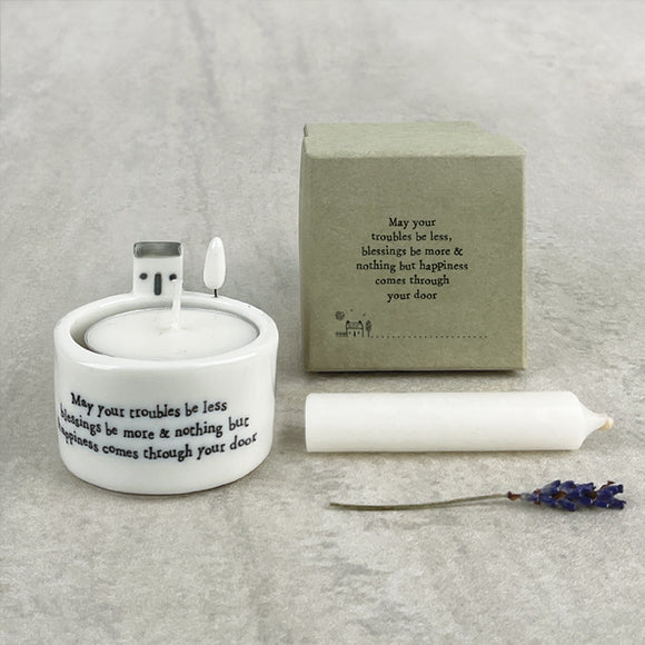 East of India Perfect Gifts with a meaningful quotes;  Small round T-LIght holder 5x5cm with a decorative top with a house & tree   'May your troubles be less  blessings be more & nothing but happiness comes through your door'  5731