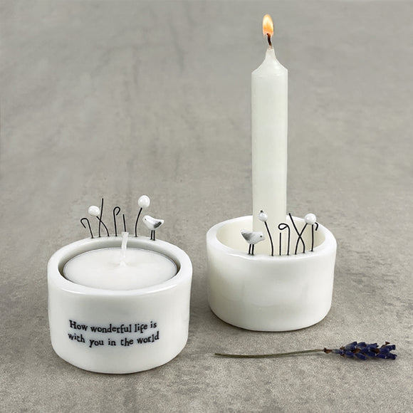East of India Perfect Gifts with a meaningful quotes;  Small round T-LIght holder 5x5cm with a decorative top with a house & tree   'How wonderful life is with you in the world' 