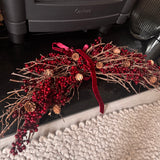 Festive hanging decoration with deep red &amp; burgundy berries with natural twigs &amp; pinecones and matching velvet ribbon bows 60cm