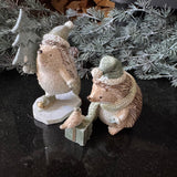 Festive sparkle Hedgehog skating with a tree
