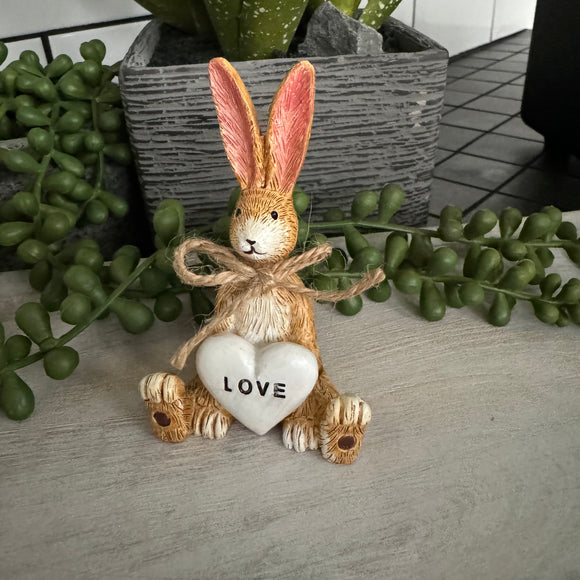 Ruth Rabbit Sitting Figure 8.5cm holding a quotable white heart reading  'Love'