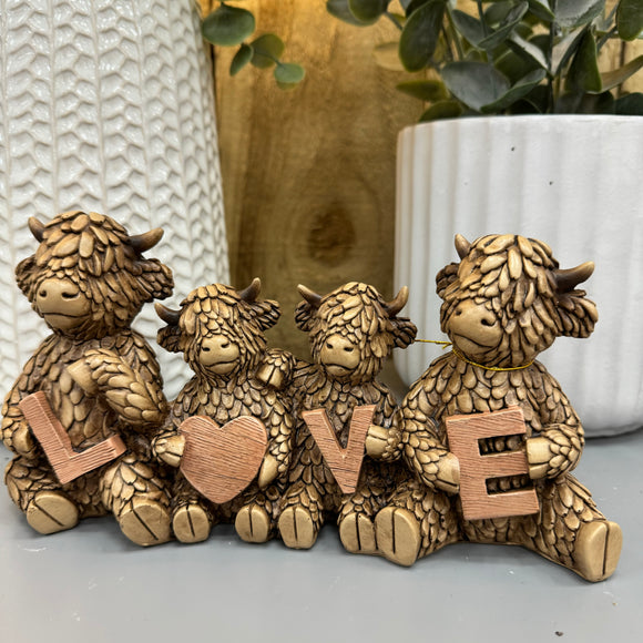 Hughie Highland Cow Figurine Collection
Loveable four highland Cows sitting holding the letters LOVE