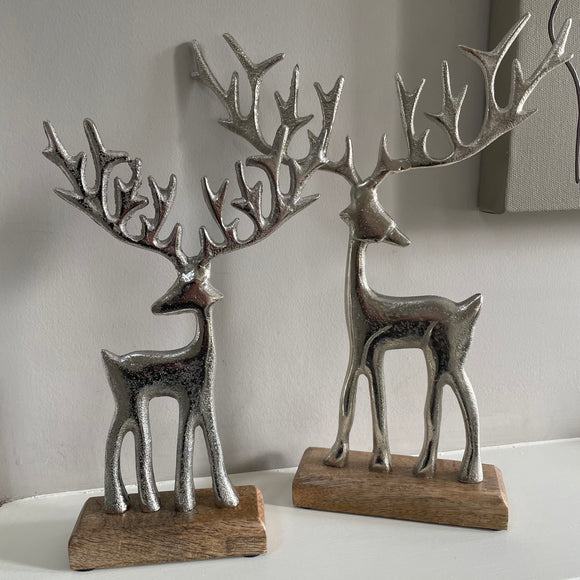 Brushed Silver Reindeers with large antlers on Wooden Base Available in 2 sizes; 23cm & 30cm