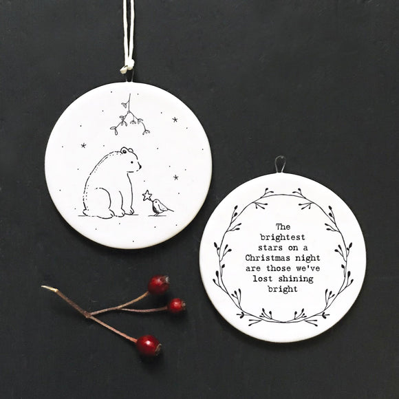 East of India Hanging Flat Round 5.5cm Porcelain Quotable Bauble

Image on one side - Mistletoe, Polar Bear & Robin holding a star

Quote on the other side - 'The brightest stars on a Christmas night are those we've lost shining bright'

Dimensions - 5.5 x 5.5 x 0.4cm
