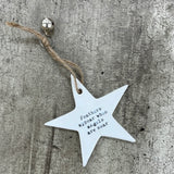 White ceramic hanging star 8.5cm with sentimental quote; 'Feathers appear when angels are near'