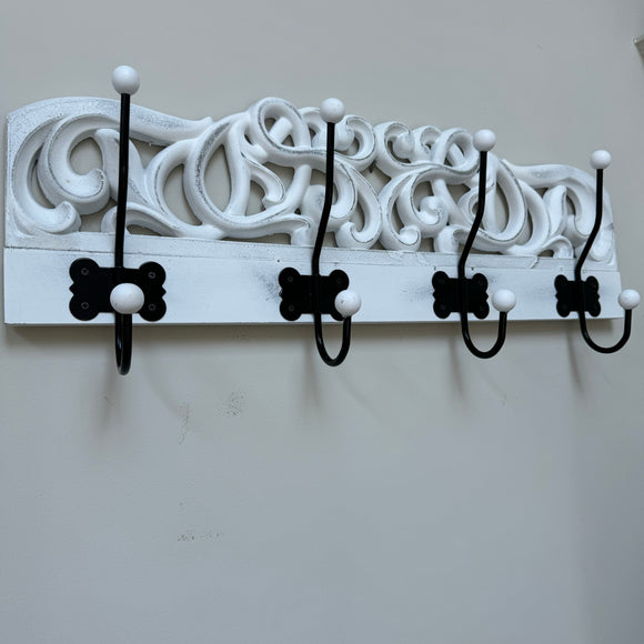 <h3><strong>Whitewashed Carved Wall Hooks 59cm</strong></h3> <p><strong>Has 4 strong black large hooks 18cm</strong></p>