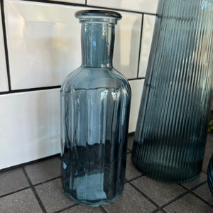 Blue&nbsp;Small&nbsp;Glass Bottle Vases
Various styles
Small Geometric Bottle H9.2cm x 5cm

Leaf bottle Vase H13cm&nbsp;
Tall Slim Ribbed Vase H22.5 x Dia 10cm
Round Ribbed H8.4 x Dia8.3cm