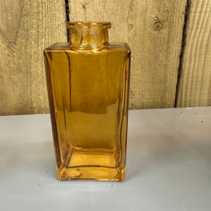 Amber Small Glass Bottle Vases
Various styles
Tall 12 x 5.5cm

Small 10.5 x 7.2cm&nbsp;