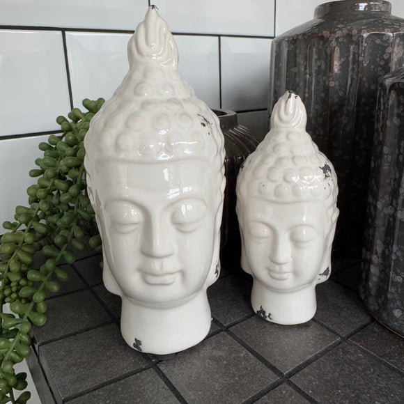 Distressed White glazed ceramic decorative Buddha Heads
Available in two sizes; Small H13.5cm & Medium H19cm