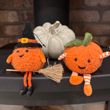 Fabric pumpkin decoration with dangling legs