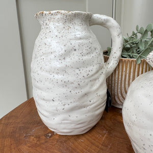 Off-white Speckled Rim Round Beba Jug
Available in 2 sizes - Small 9.5cm &amp;&nbsp; Large 18.5cm