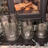 Smokey Grey Glass Candle Holders featuring embossed Christmas tree around the exterior
Available in 3 sizes - Small 13.5cm, Medium 16.5cm &amp; Large 22cm